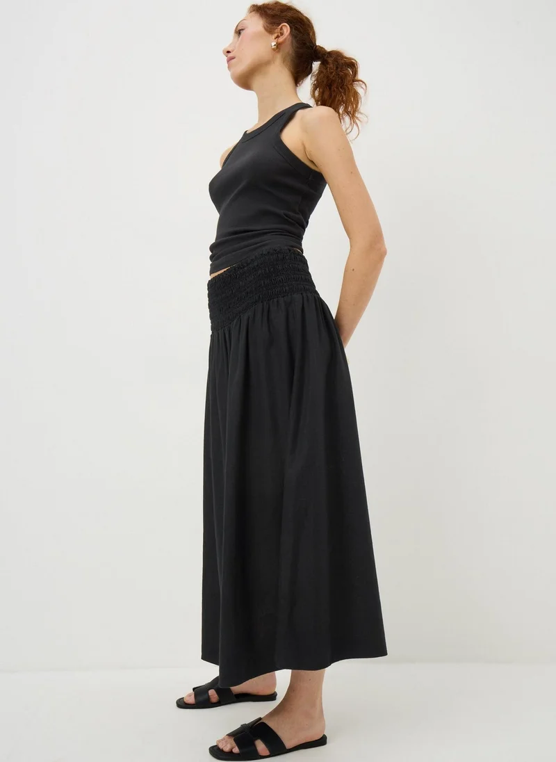 ماتلان تنورة ميدي سوداء من الكتان